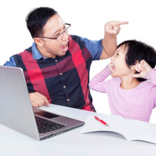 Dad giving order on his child to study